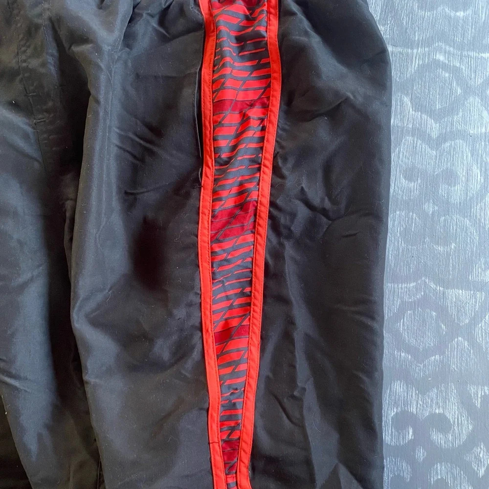 Nike Black and Red‎ lined swim trunks men’s size medium swoosh